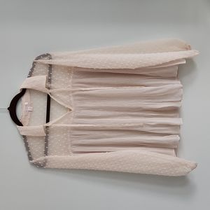 NWOT Sheer, flowy, long sleeve blouse. Collar and tie front. Size small.